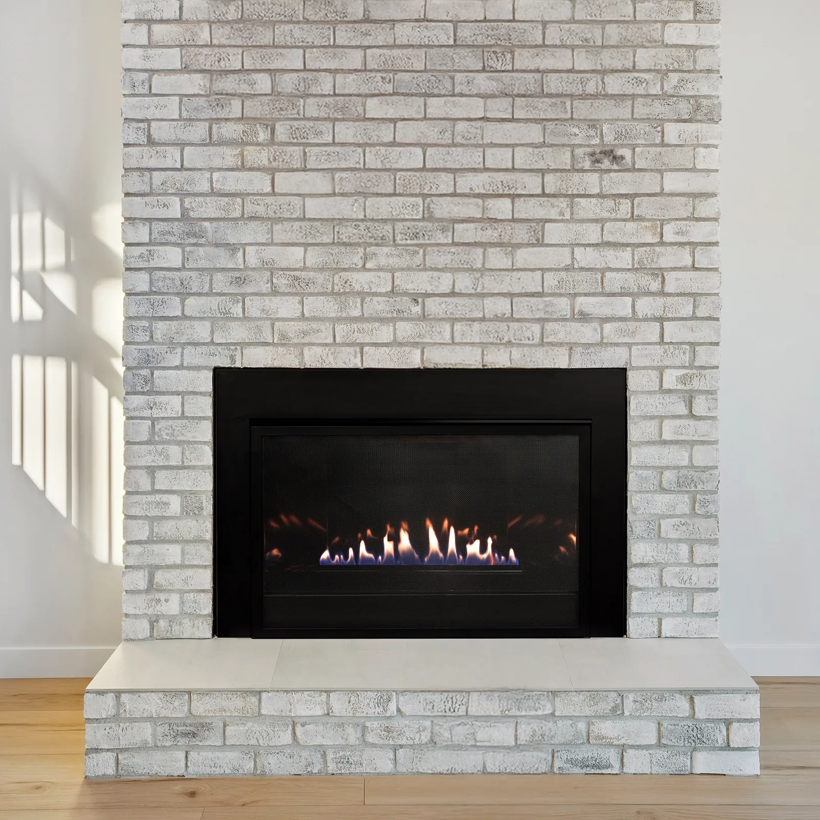 White Mountain Hearth (Empire) Loft Vent-Free Insert — Loft vent-free insert installed room view